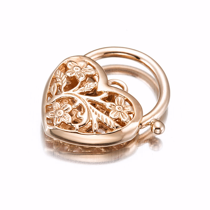 Classic 18ct Heavy Rose Gold Plated Filigree Heart Locket, showcasing intricate design and luxurious finish.
