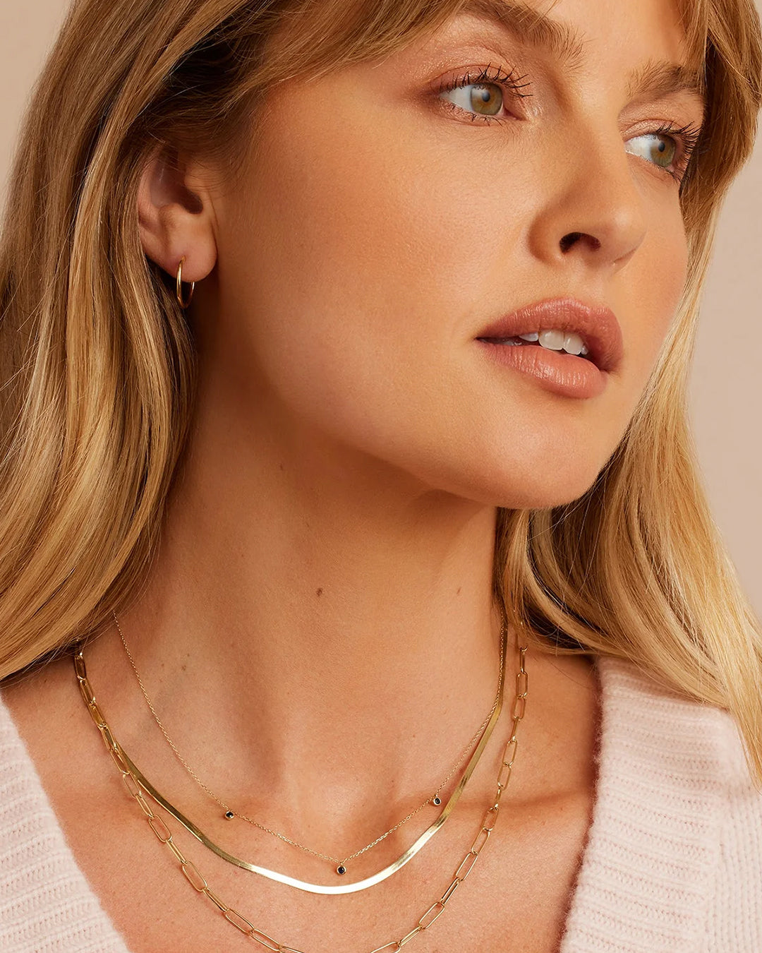 Classic Blue Sapphire Trio Necklace featuring three genuine sapphires on a delicate gold chain, adjustable for a perfect fit.