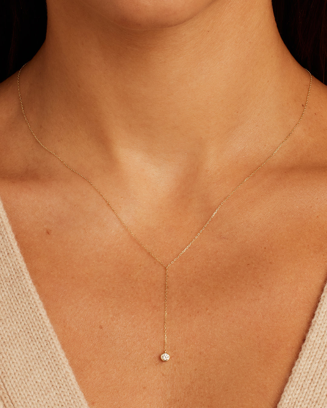 Elegant Classic Diamond Lariat necklace featuring a dazzling diamond centerpiece, showcasing its timeless design and high-quality craftsmanship.