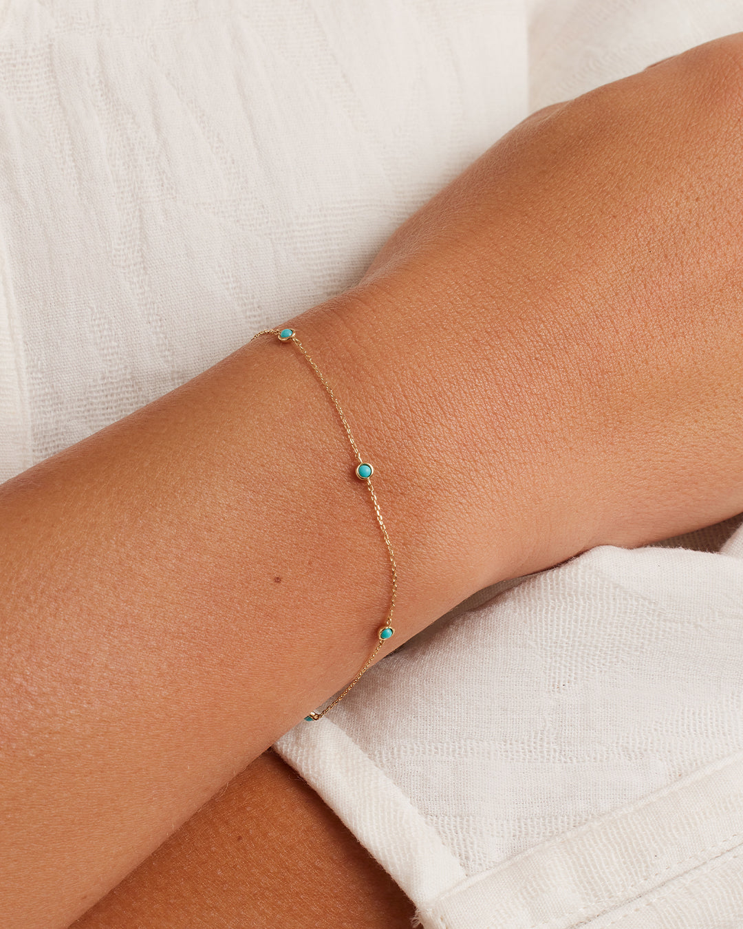 A beautiful Classic Five Turquoise Bracelet featuring five vibrant turquoise stones set in an elegant design.