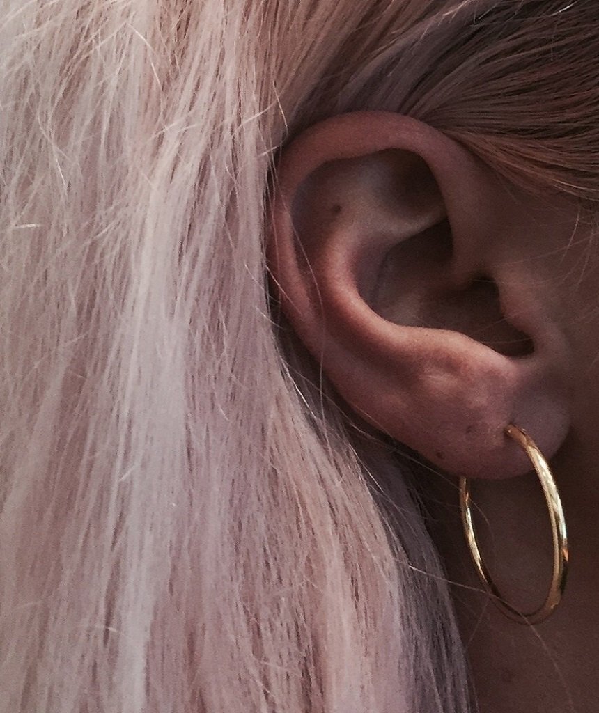 Classic Gold Hoop earrings made of sterling silver with 18k gold plating, showcasing a timeless and elegant design.