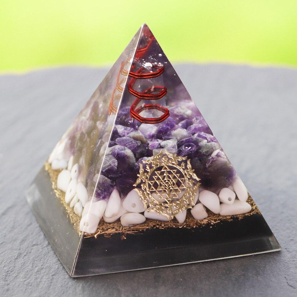 Clear Quartz Energy Point orgonite pyramid for EMF protection and chakra healing, handcrafted with natural stones.