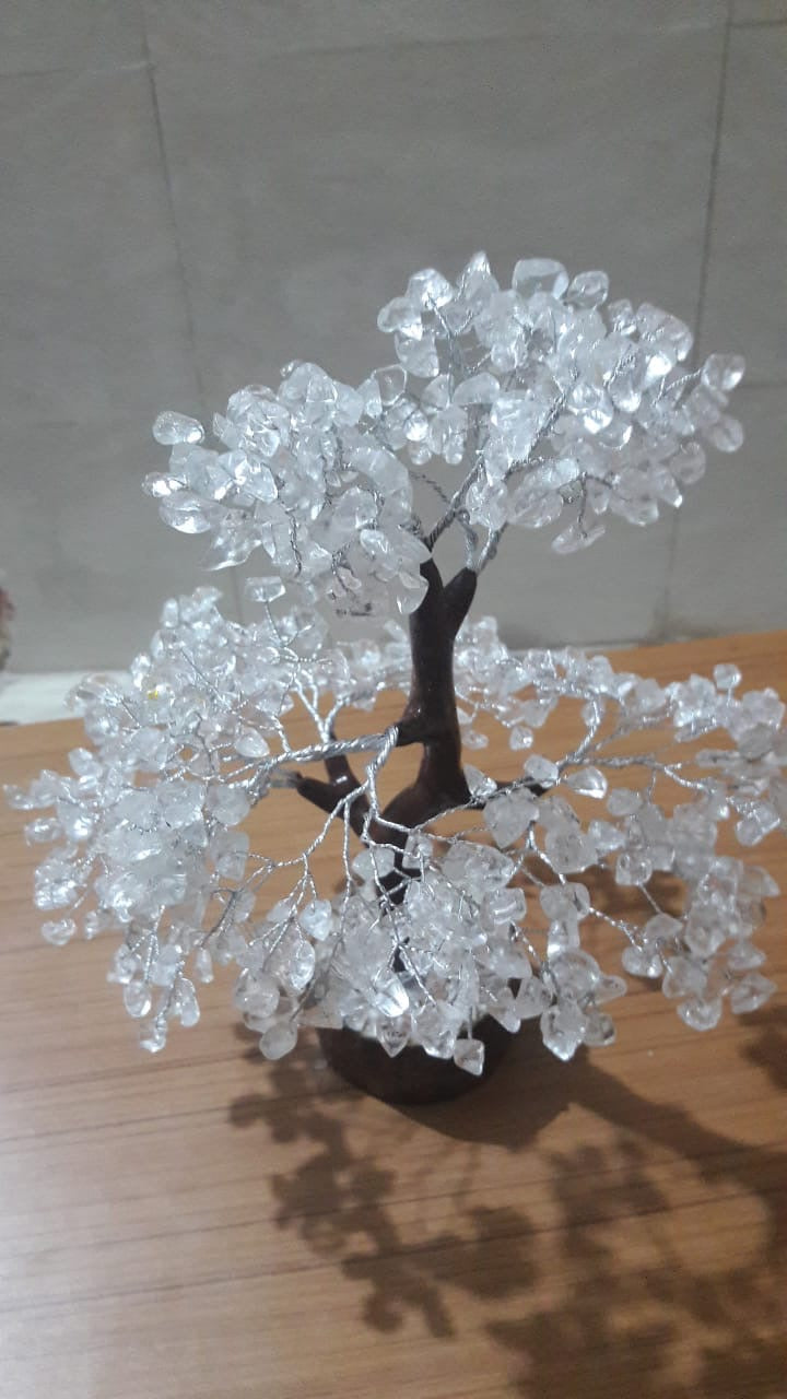 Handcrafted Clear Quartz Tree with 500 gemstone chips on a wooden base, symbolizing purity and spiritual growth.