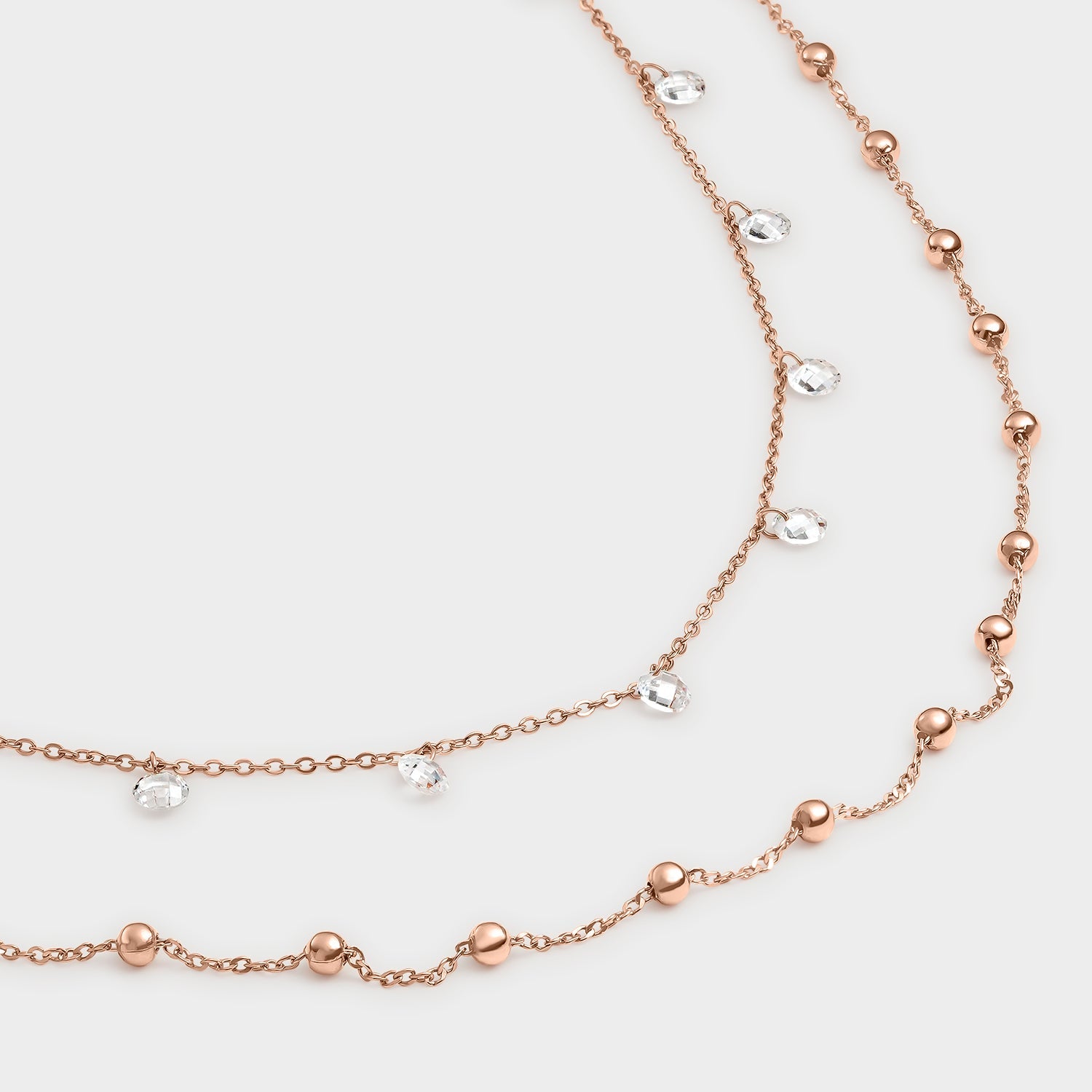 Collar doble de oro rosa con circonitas blancas, elegante y sofisticado, ideal para cualquier ocasión.