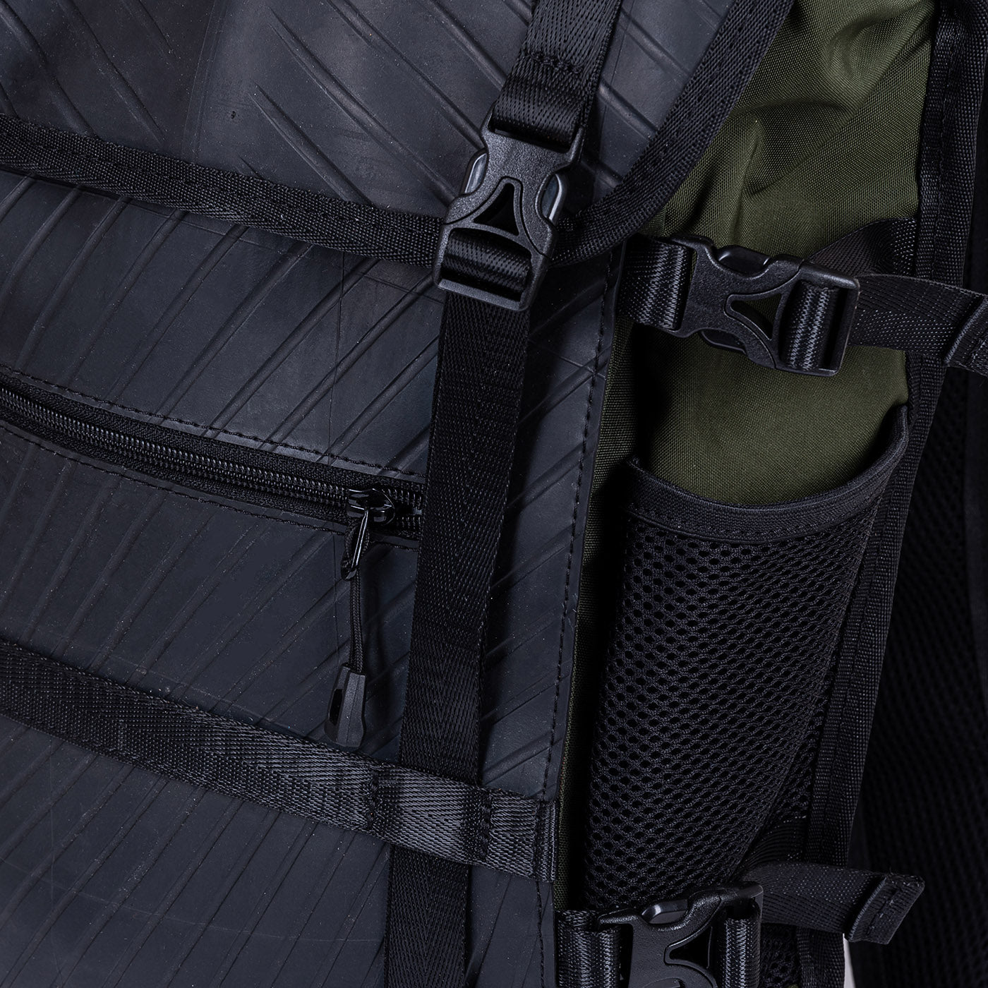Colonel Vegan Water Resistant Backpack featuring a padded laptop compartment, made from reclaimed materials, showcasing its eco-friendly design.