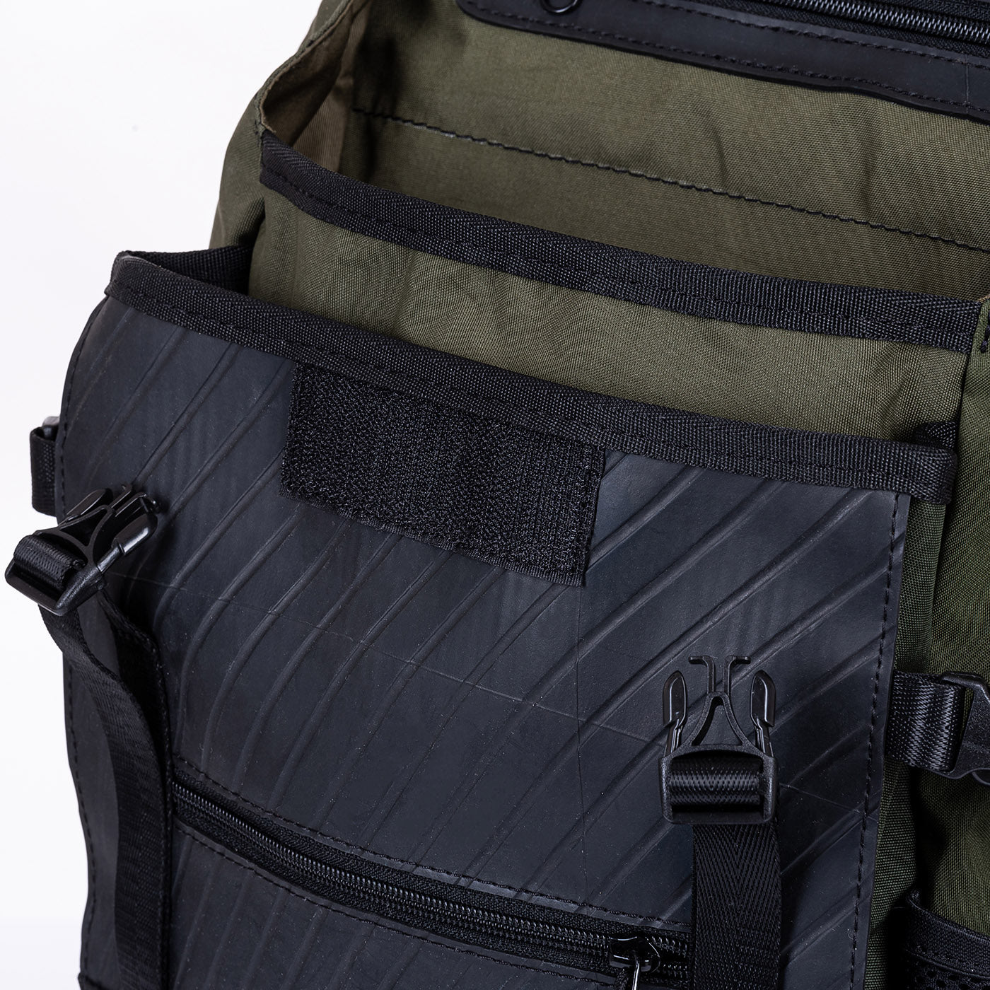 Colonel Vegan Water Resistant Backpack featuring a padded laptop compartment, made from reclaimed materials, showcasing its eco-friendly design.