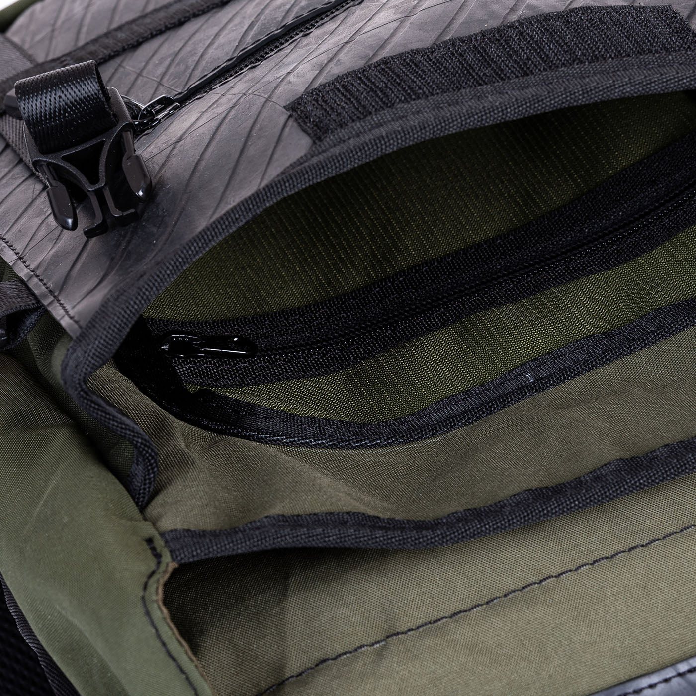 Colonel Vegan Water Resistant Backpack featuring a padded laptop compartment, made from reclaimed materials, showcasing its eco-friendly design.