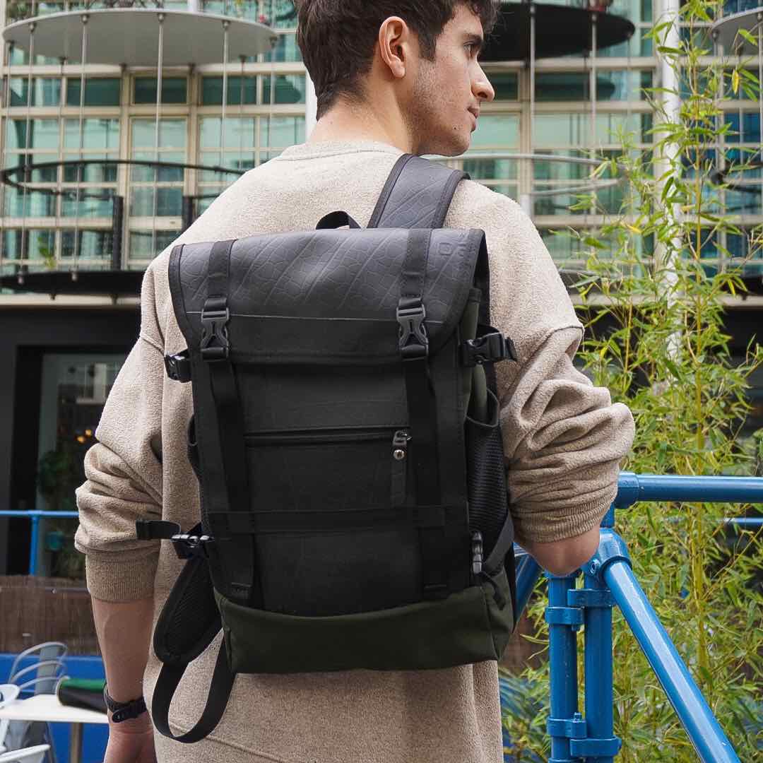Colonel Vegan Water Resistant Backpack featuring a padded laptop compartment, made from reclaimed materials, showcasing its eco-friendly design.