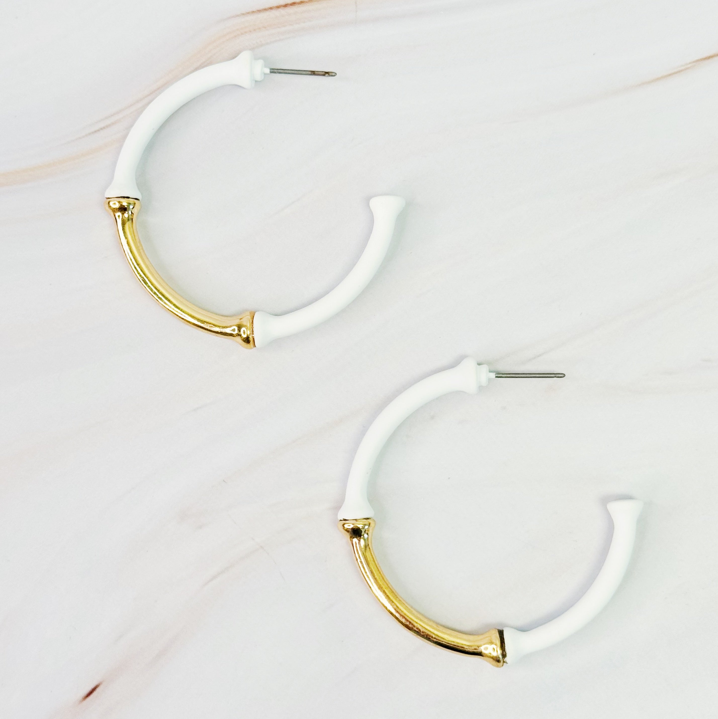 Color Coated Bamboo Hoop Earrings in vibrant colors, showcasing a unique bamboo design and lightweight structure.