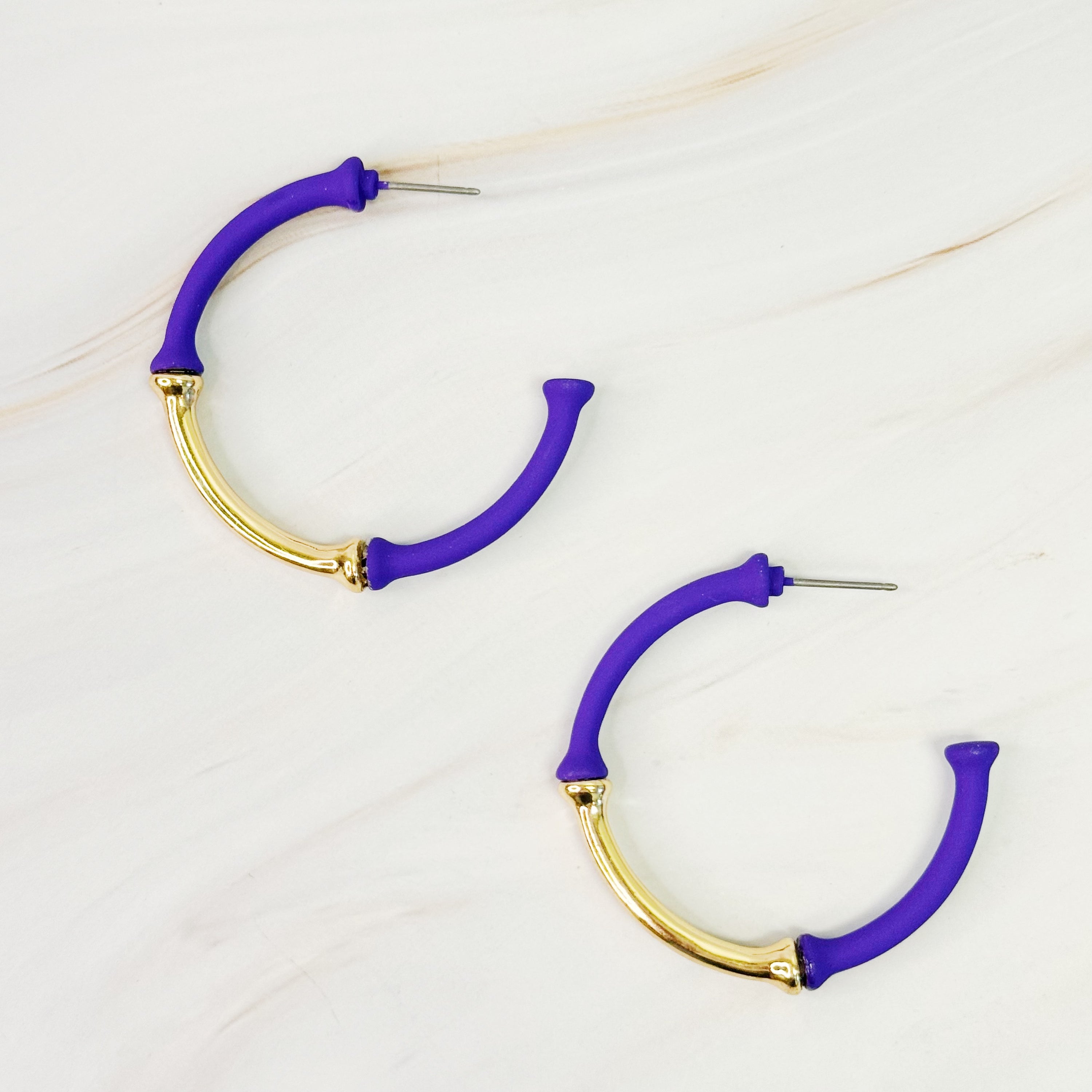 Color Coated Bamboo Hoop Earrings in vibrant colors, showcasing a unique bamboo design and lightweight structure.