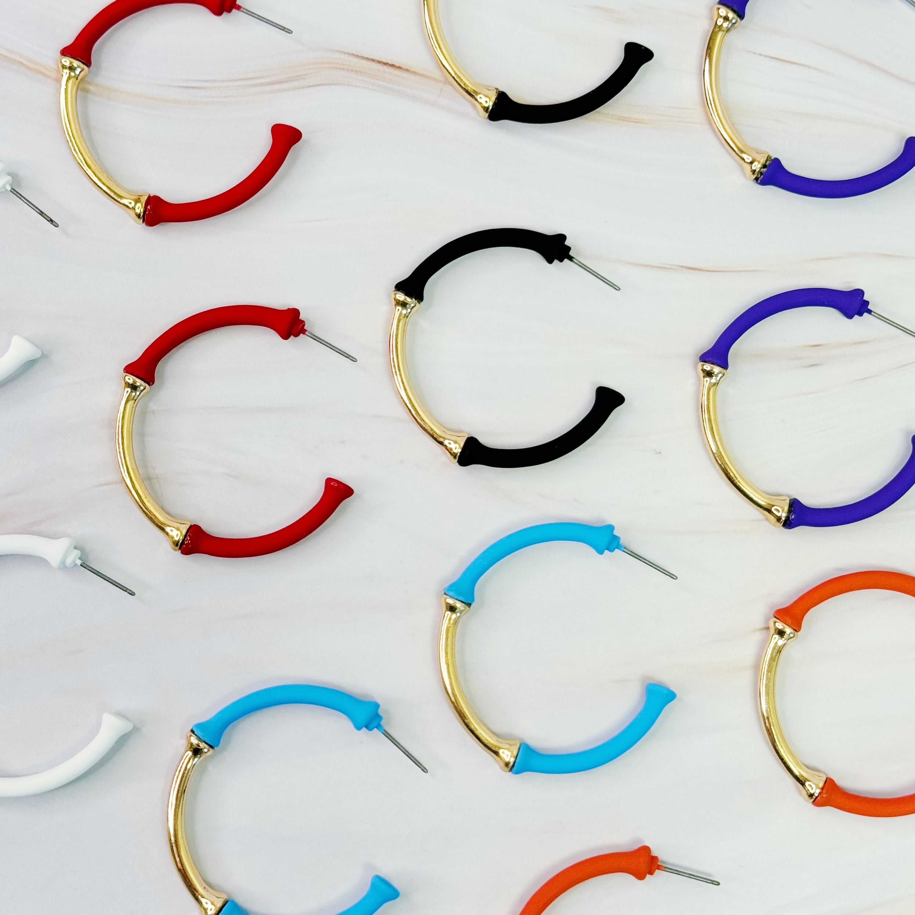 Color Coated Bamboo Hoop Earrings in vibrant colors, showcasing a unique bamboo design and lightweight structure.