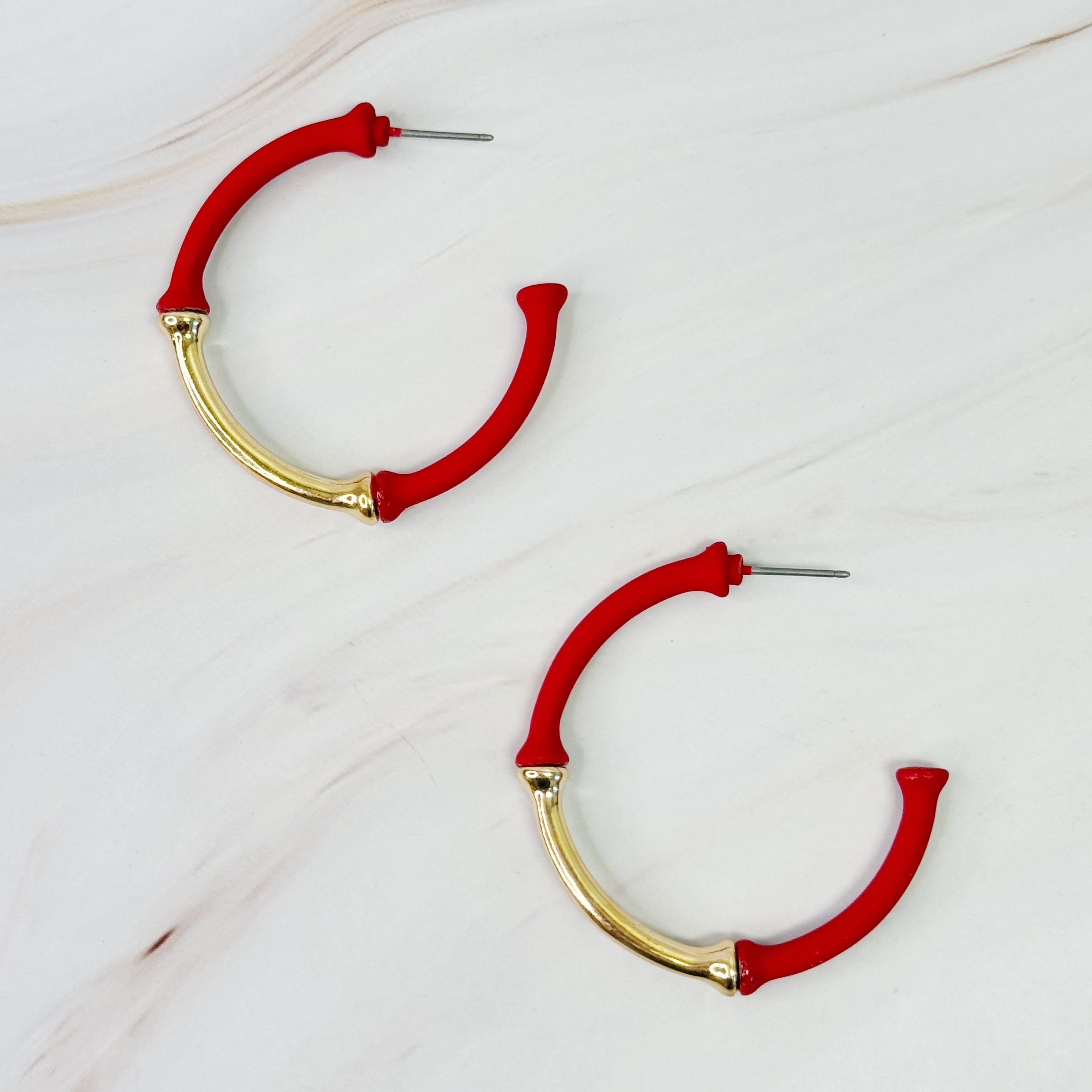 Color Coated Bamboo Hoop Earrings in vibrant colors, showcasing a unique bamboo design and lightweight structure.