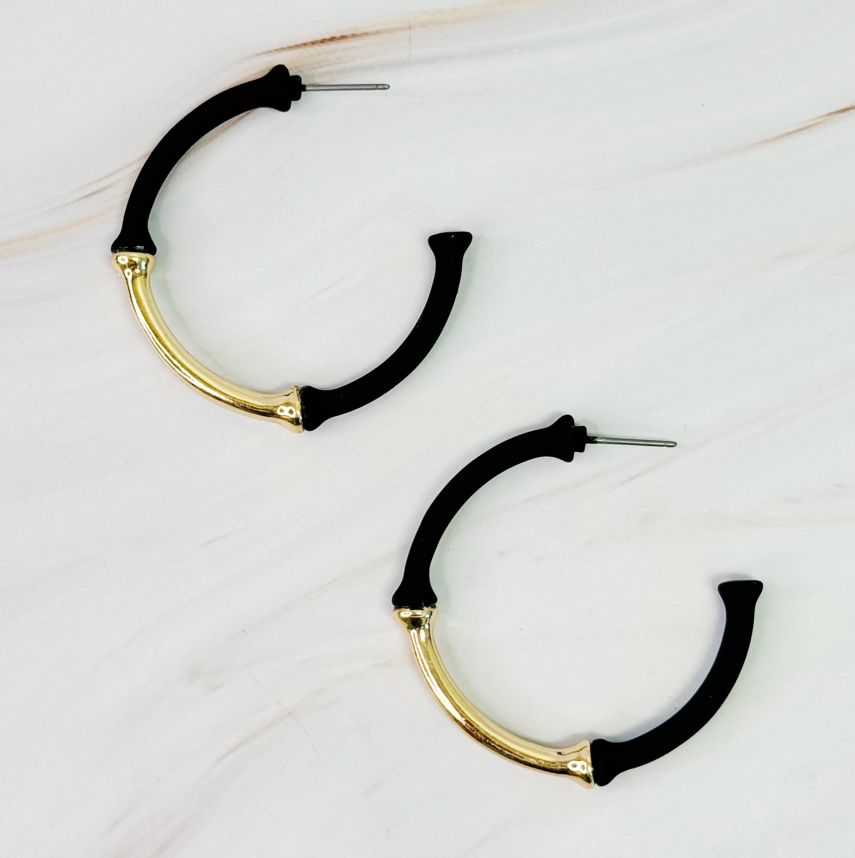Color Coated Bamboo Hoop Earrings in vibrant colors, showcasing a unique bamboo design and lightweight structure.