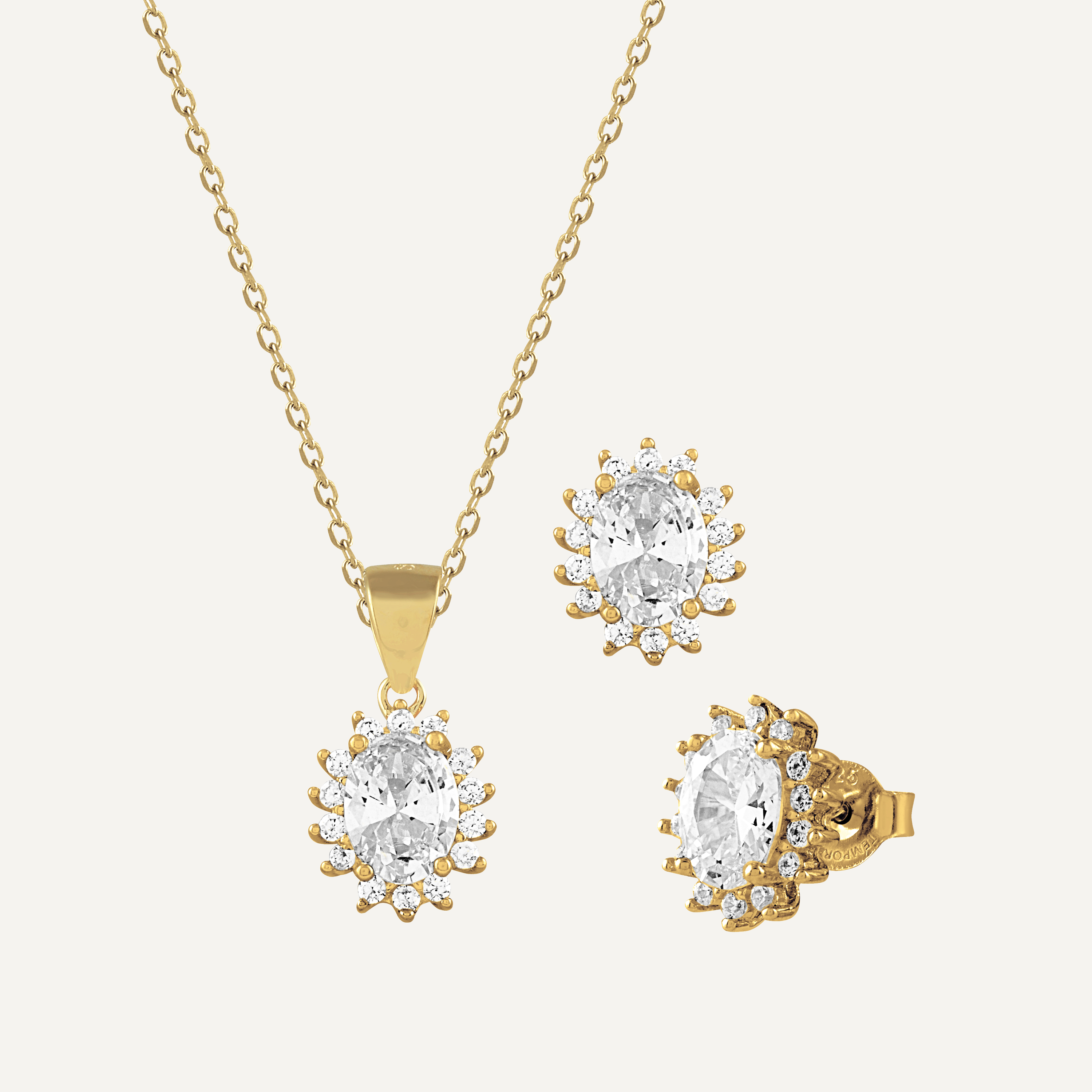 Conjunto de collar y pendientes con circonitas blancas en forma de flor, fabricado en Plata 925 bañada en oro de 18K, elegante y sofisticado.