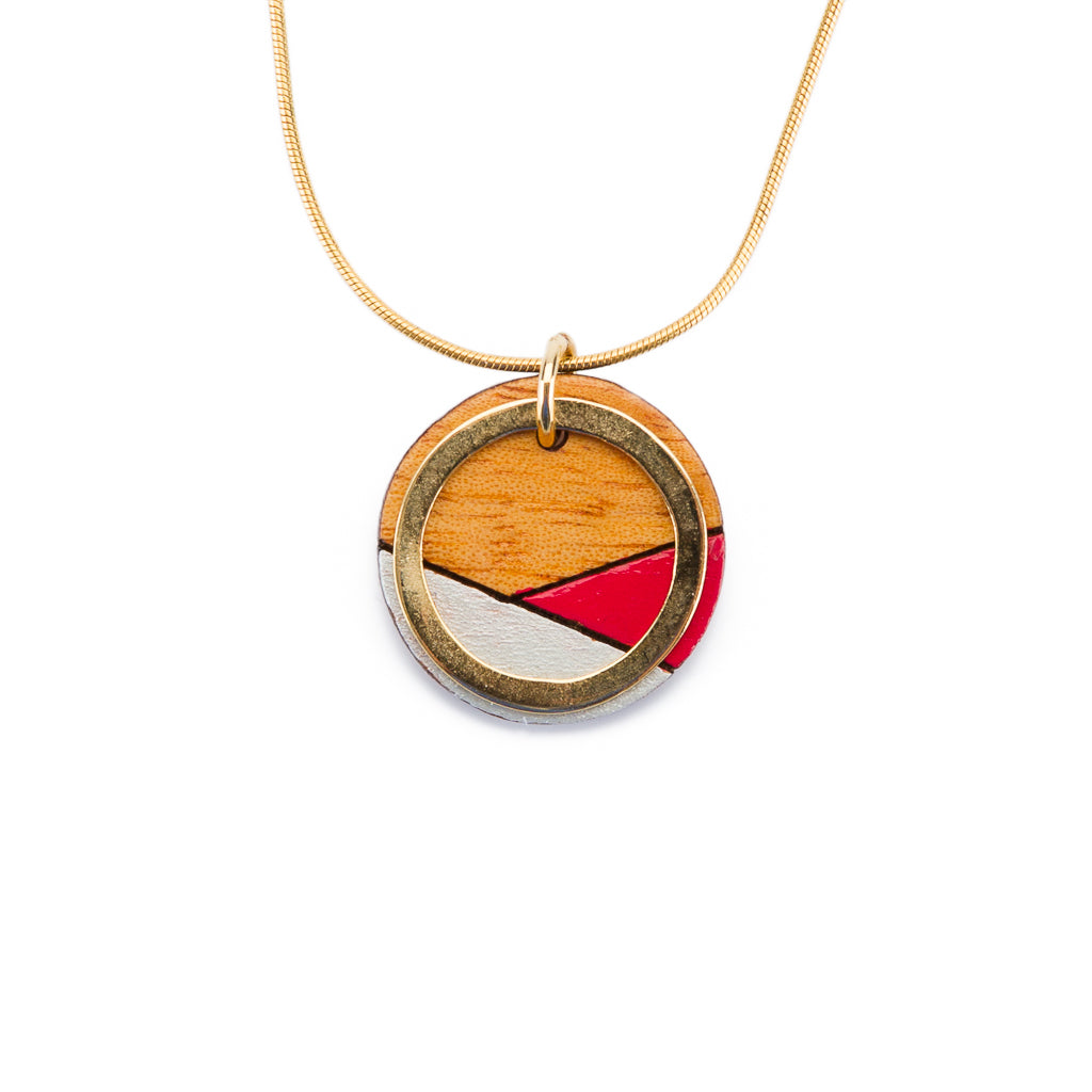Conture Recycled Wood Gold Chain Necklace featuring a unique wooden pendant and gold plated chain, available in four nature-inspired colors.