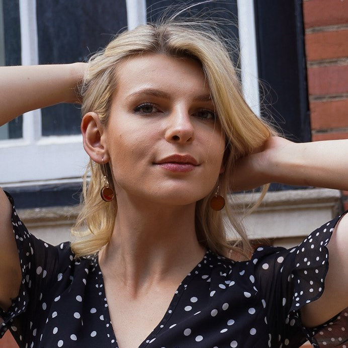 Conture Recycled Wood Silver Dangle Earrings in six vibrant colors, showcasing unique handcrafted designs made from recycled materials.