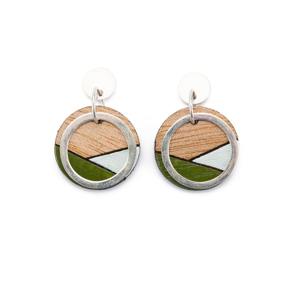 Conture Recycled Wood Silver Earrings showcasing unique wood patterns and sterling silver backing, available in six colors.