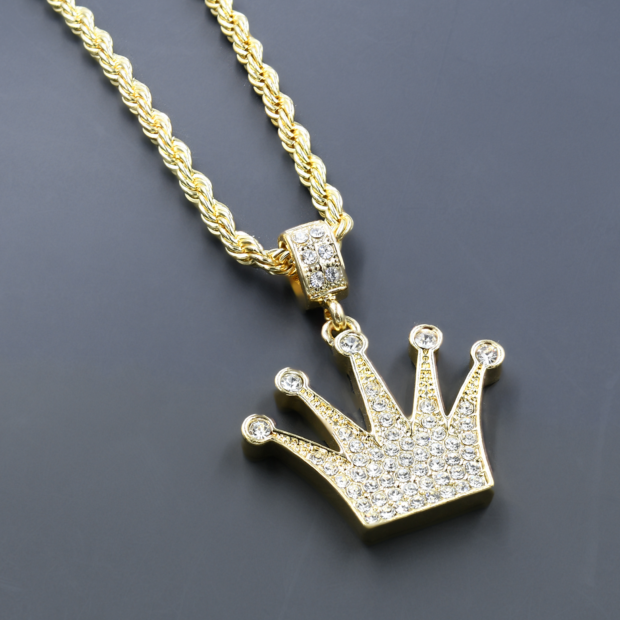 Intricate hip-hop jewelry featuring a crystal-studded pendant and a 24'' rope chain, showcasing elegance and style.