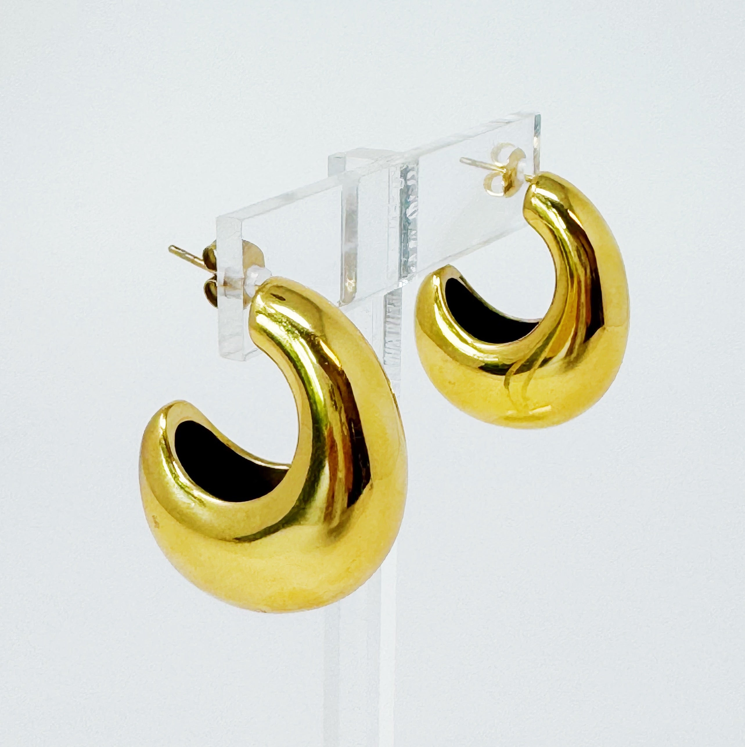 Crescent Halo Golden Hoop Earrings showcasing a unique crescent shape design in 18k gold plated stainless steel.