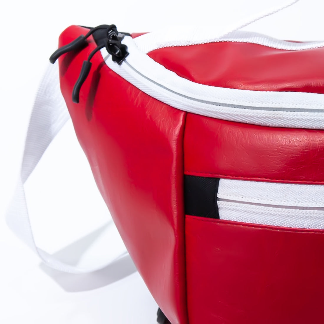 CRLi Alsa Red Fanny Bag made from zero waste PU eco leather, featuring a sleek design and adjustable strap for versatile wear.