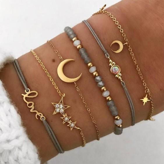 Crystal Celestial Marble 6 Piece Bracelet Set featuring 14K gold plating, black marble design, and celestial pendant with white crystals.