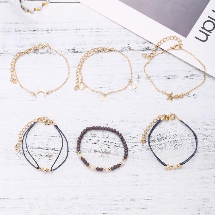 Crystal Celestial Marble 6 Piece Bracelet Set featuring 14K gold plating, black marble design, and celestial pendant with white crystals.