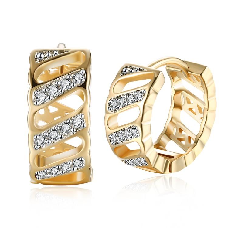 Elegant Crystal Curved Hollow Huggies in 18K Gold, showcasing their unique design and sparkling crystals.
