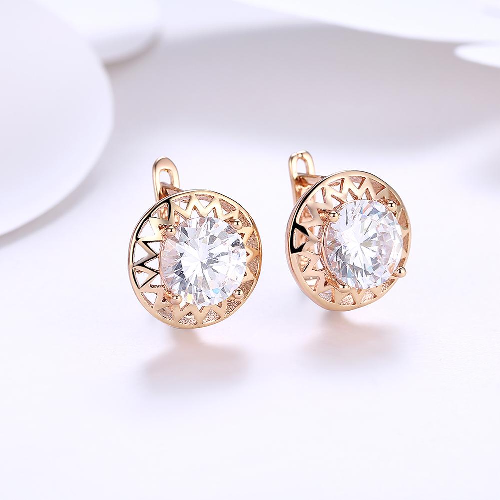 Elegant Crystal Filigree Circular Leverback Earrings set in 18K gold, showcasing intricate design and butterfly backing.