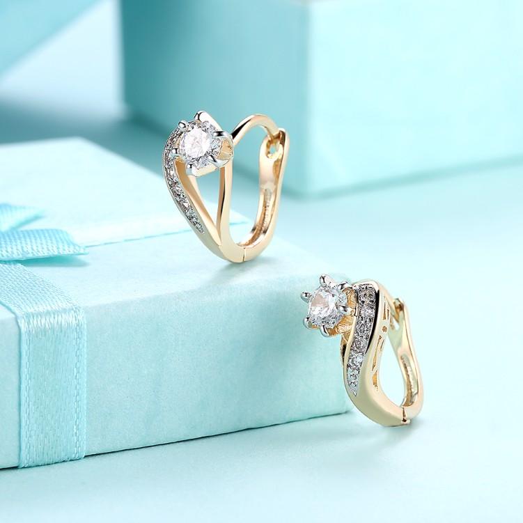 Elegant heart-shaped earrings featuring sparkling crystals set in 18K gold plating, designed for comfort and style.