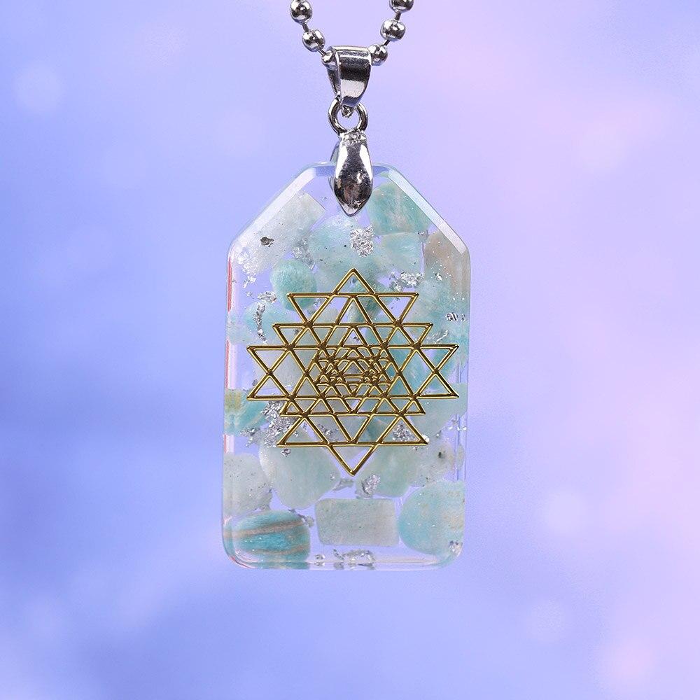 Crystal Stones Chakra Jewelry Resin Pendant Orgone Necklace featuring vibrant crystals and geometric design, perfect for women.