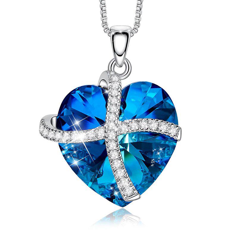Elegant Crystals Bermuda Blue Pave Heart Ribbon Necklace featuring gold-plated mounts and sparkling crystals, perfect for any occasion.