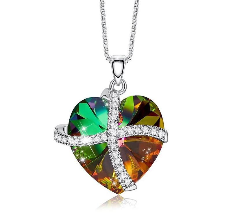 A stunning Crystals Rainbow Pave Heart Ribbon Necklace featuring gold-plated mounts and sparkling crystals, perfect for elegant occasions.