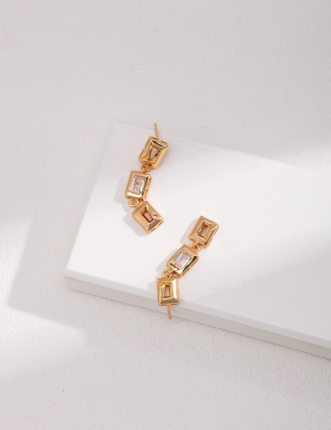 Elegant Cubic Zircon Rectangular Dangle Earrings in gold vermeil, showcasing their stunning design and craftsmanship.