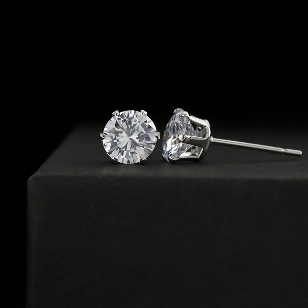 A pair of elegant 6mm cubic zirconia stud earrings set in 14K white gold.