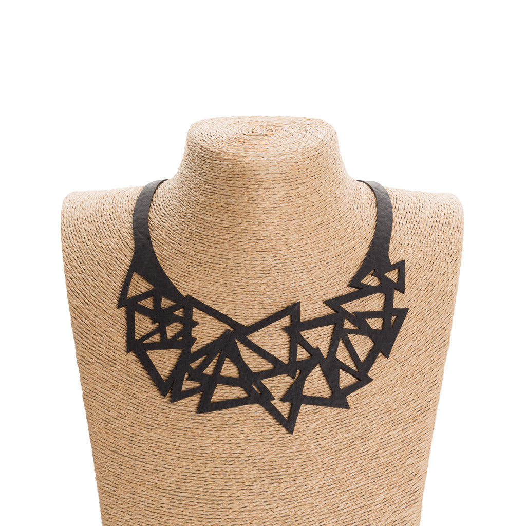 Cubism Geometric Recycled Rubber Necklace featuring unique black patterns, handmade from recycled tyre inner tubes.