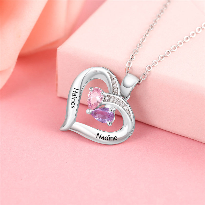 Custom 925 Sterling Silver Two Birthstone Necklace featuring personalized birthstones and available in multiple finishes.