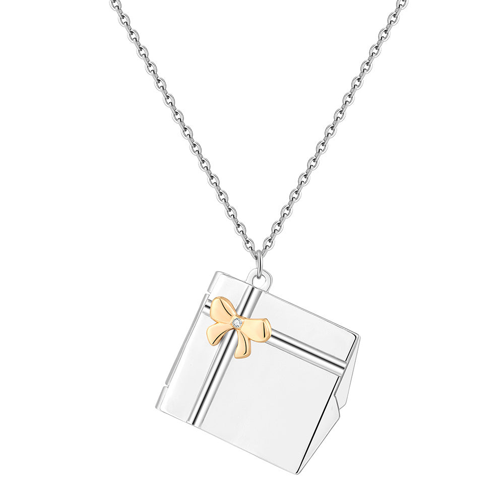 Custom Name Gift Box Necklace made of stainless steel, featuring a personalized name pendant, elegantly displayed in a gift box.