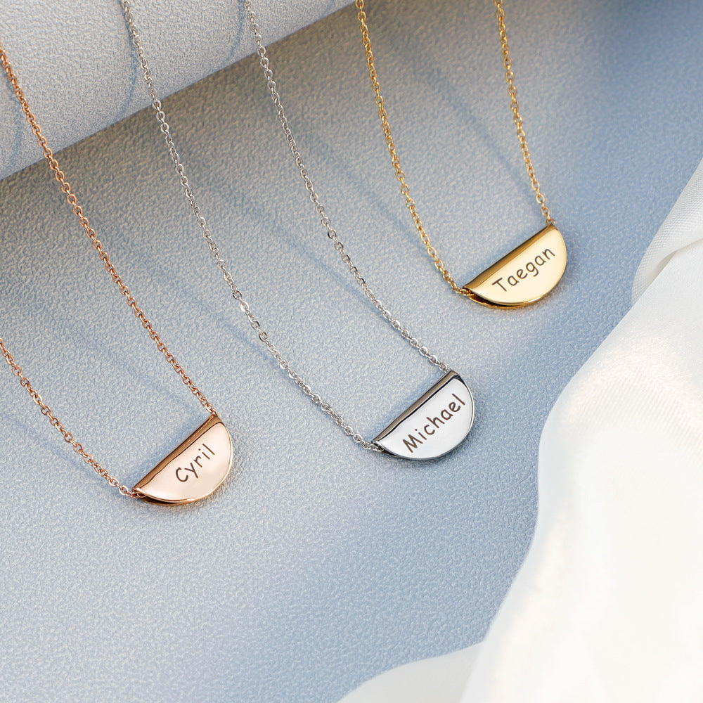 A beautiful Custom Name Half Moon Necklace made of stainless steel, showcasing its elegant design and adjustable length.