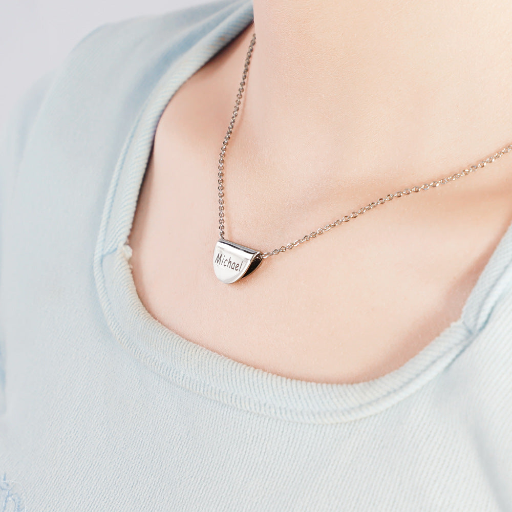 A beautiful Custom Name Half Moon Necklace made of stainless steel, showcasing its elegant design and adjustable length.