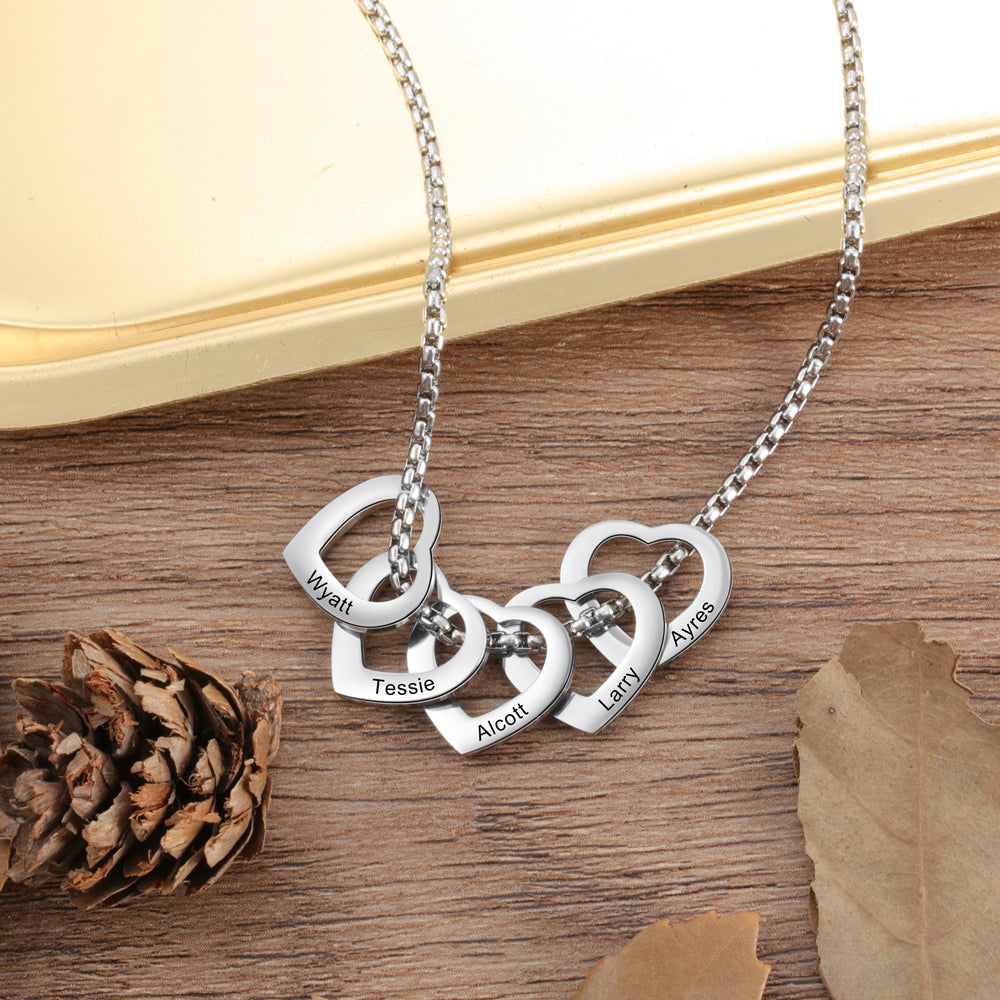 Custom Name Heart Pendant Necklace made of stainless steel, featuring a heart-shaped pendant with personalized engraving options.