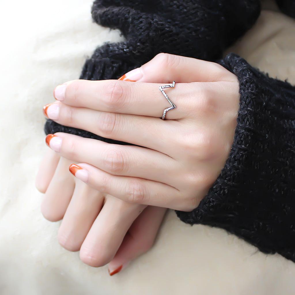 DA107 High Polished Stainless Steel Ring featuring AAA Grade clear CZ center stone, showcasing its elegant design and shine.