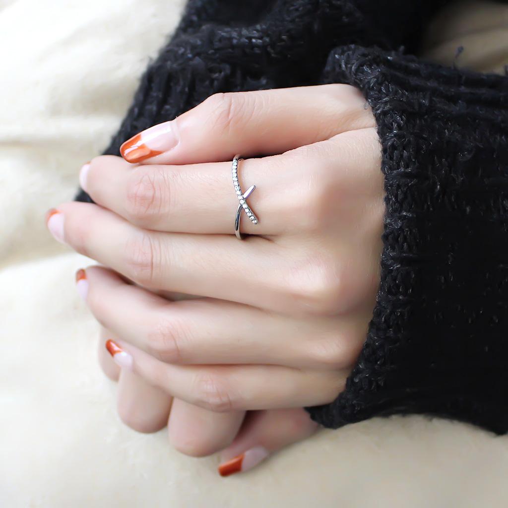 DA112 High Polished Stainless Steel Ring featuring a clear AAA Grade CZ center stone, showcasing a brilliant shine and elegant design.