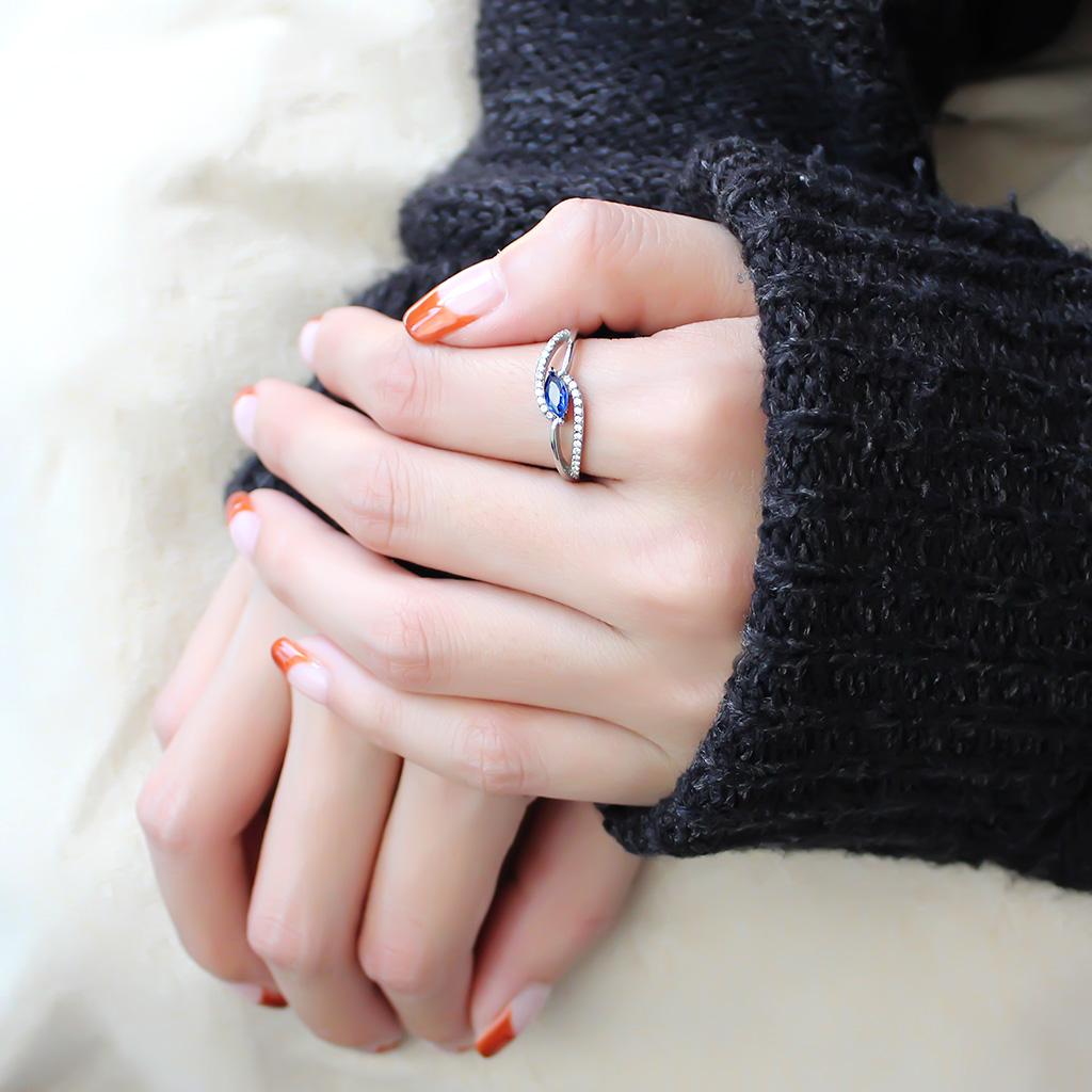 DA122 High Polished Stainless Steel Ring featuring a AAA Grade London Blue CZ stone, showcasing its elegant design and polished finish.