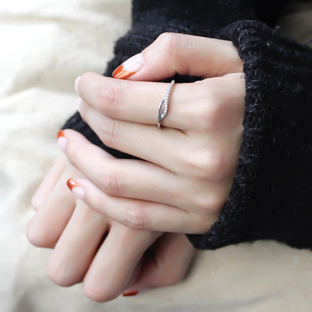 DA113 High Polished Stainless Steel Ring featuring a clear AAA Grade CZ center stone, showcasing a brilliant shine and elegant design.