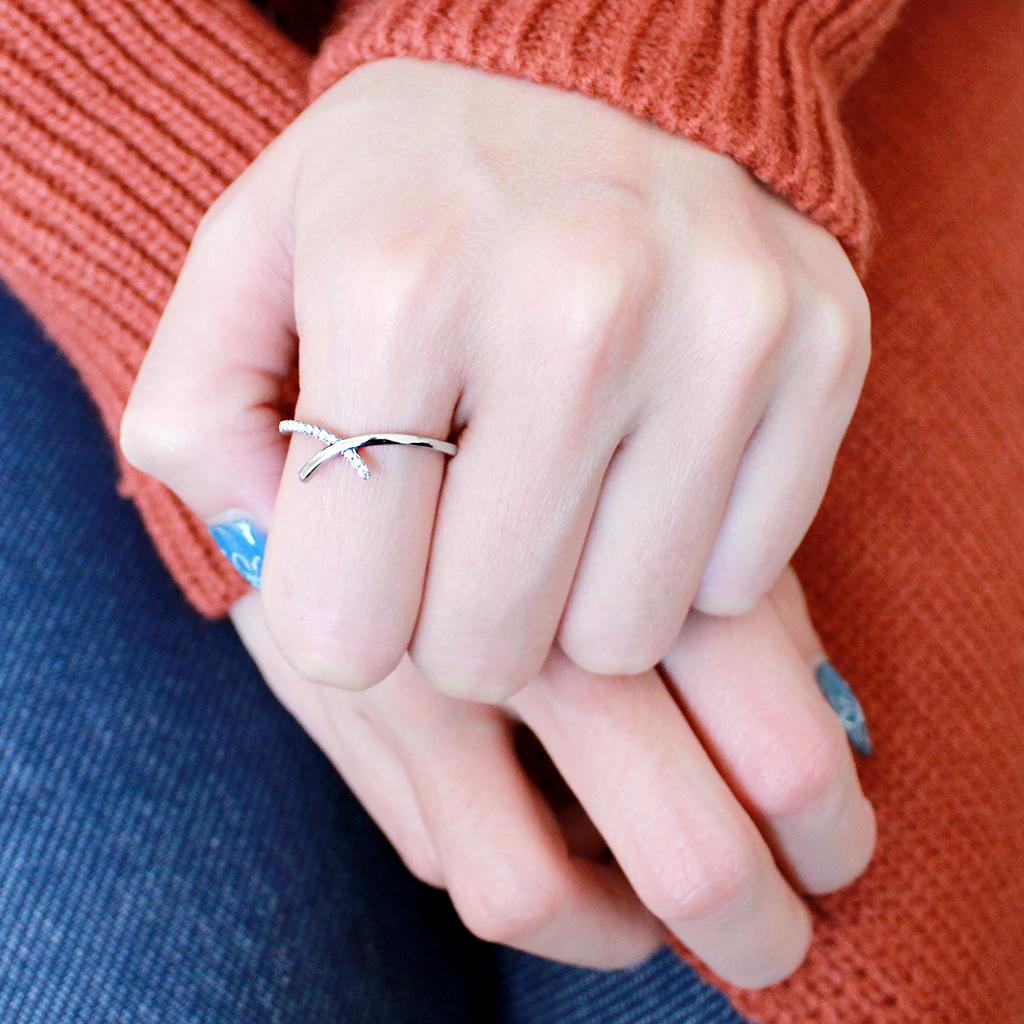 DA154 High Polished Stainless Steel Ring featuring a clear AAA Grade CZ center stone, showcasing a brilliant shine and elegant design.