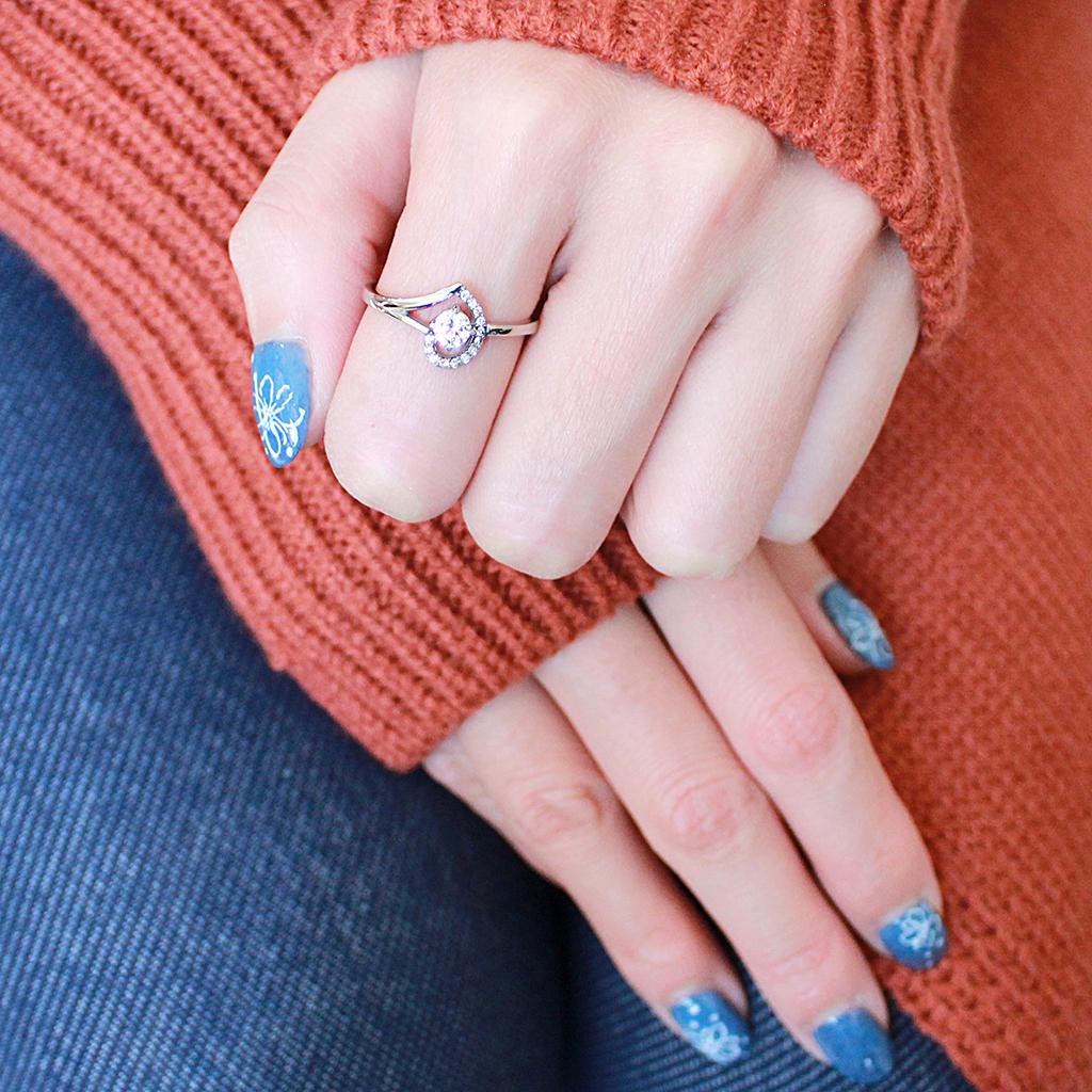 DA165 High Polished Stainless Steel Ring featuring a clear AAA Grade CZ stone, showcasing a sleek and elegant design.