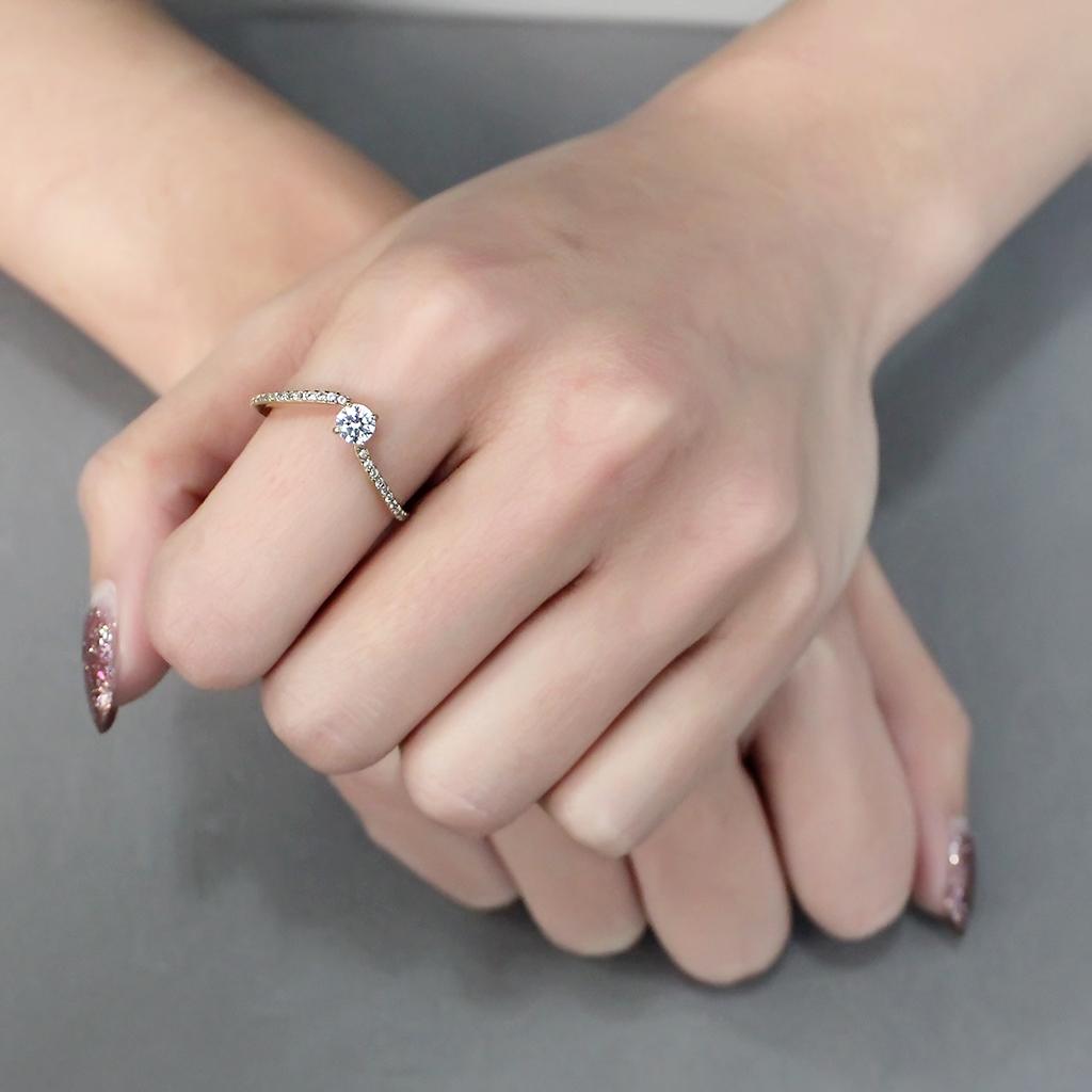 DA256 IP Gold Stainless Steel Ring featuring a clear AAA Grade CZ center stone, showcasing its elegant design and luxurious finish.