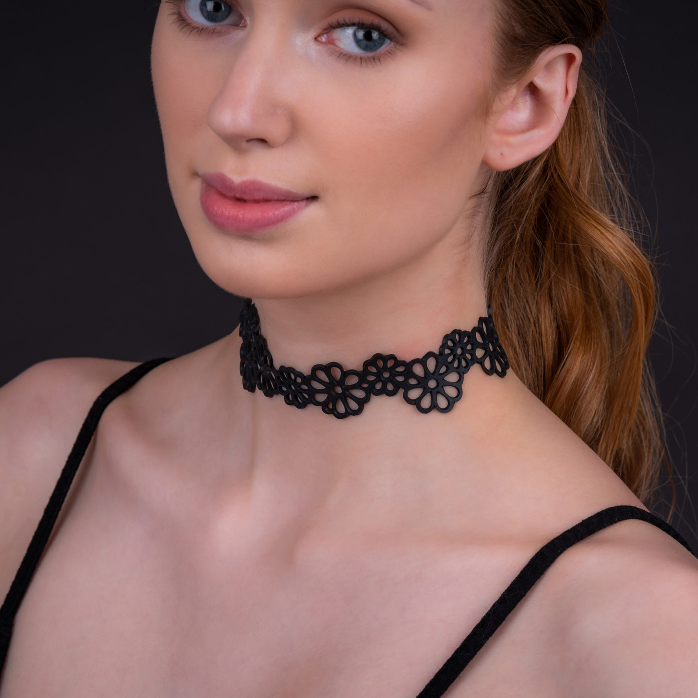 Dahlia Recycled Rubber Statement Flower Choker featuring a unique flower design made from eco-friendly materials.