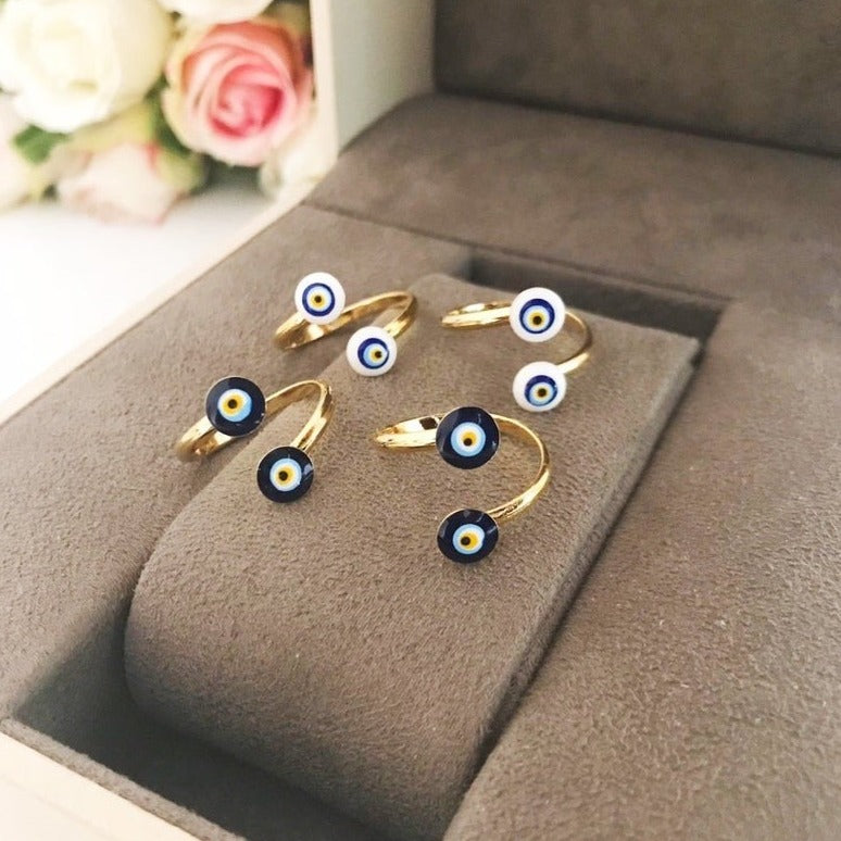 Dainty Evil Eye Blue Ring featuring a 6mm blue evil eye bead on an adjustable gold band, perfect for everyday wear.