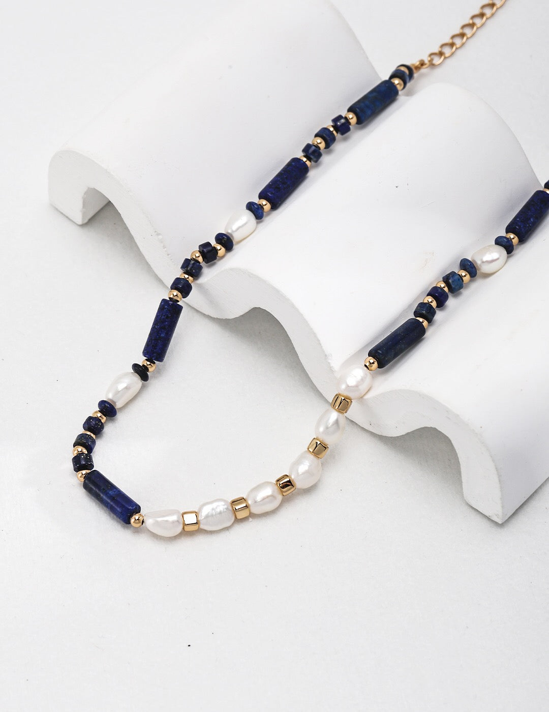 A delicate Dainty Lapis Lazuli Beaded with Pearl Necklace featuring gold vermeil accents, showcasing its elegant design and natural gemstones.